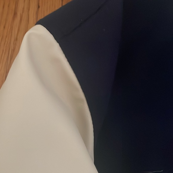 Navy blue and white letterman jacket, faux leather sleeves, soft torso. - Picture 3 of 5